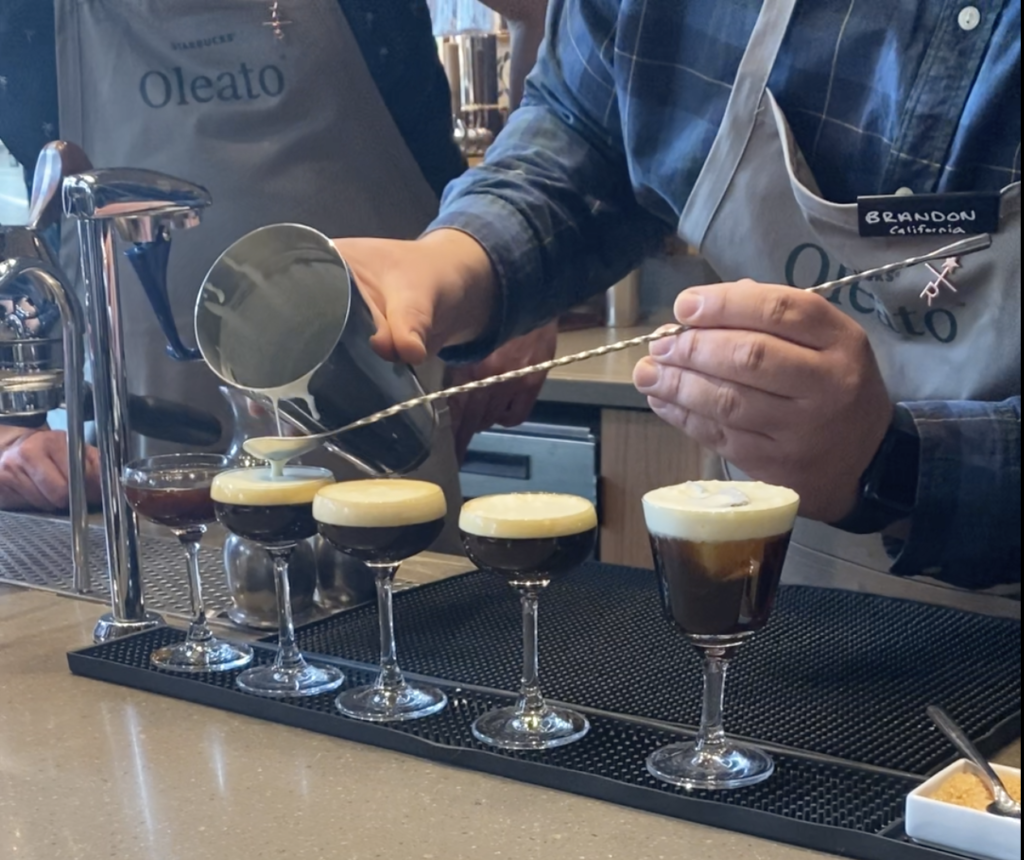 Barista creating coffee espresso martinis 